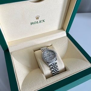 WOMEN’S ROLEX
